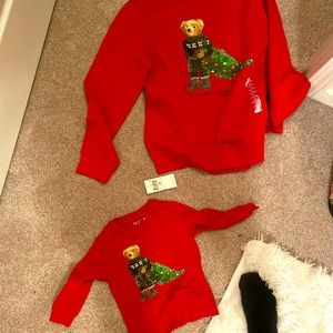 I am selling a red polo bear Ralph Lauren medium sweater and a 12 to 24mnths